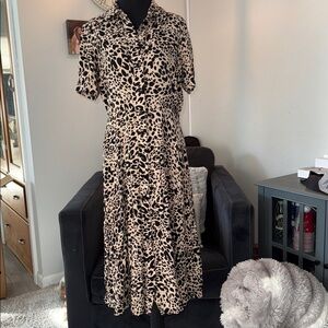 Leopard Print Women's Dress button up design. Figure flattering. Size 12